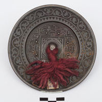Зеркало (толи - бур.) с изображением мандалы.
